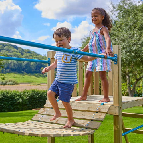 TP Toys Skywood Wooden Tower Climbing Frame with Super Wavy Slide, Sky Deck, Monkey Bars, Skyline with Rapide Swing Seat, Skybridge & Mini play tower (COLLECTION OR DUBLIN DELIVERY ONLY. DELIVERY USUALLY WITHIN 2-4 WEEKS)